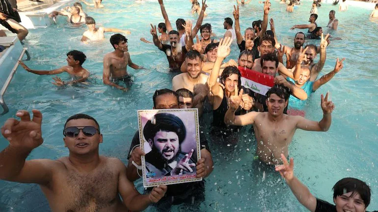 In Sri Lanka rerun, Iraq protestors storm presidential palace, take dip in pool