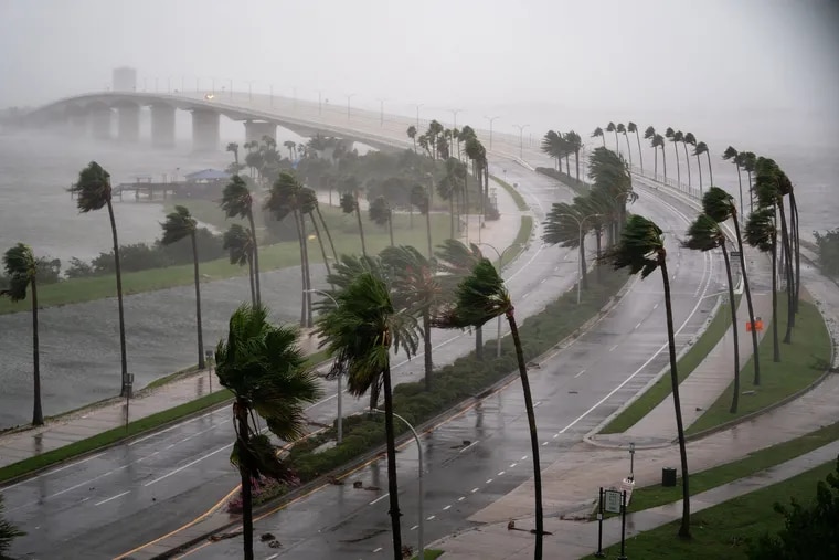 Hurricane Ian swamps southwest Florida, trapping people in homes